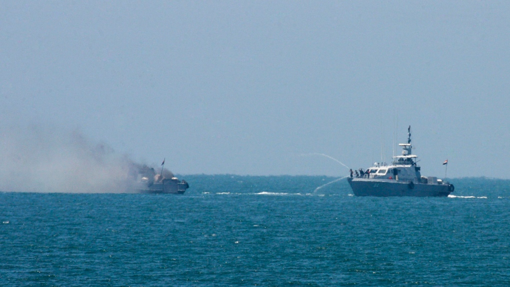 Ship on fire on the Mediterranean Sea