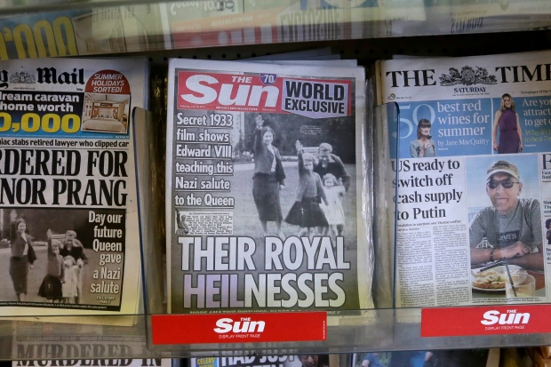The Sun newspaper shows photo of Queen saluting