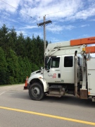 A Hydro One truck arrives at the scene where a man was electrocuted north of Aylmer, Ont. on Monday, July 20, 2015. (Bryan Bicknell / CTV London)
