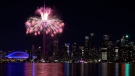 Fireworks light up the downtown Toronto city skyline during the closing ceremony for the Pan American Games in Toronto on Sunday, July 26, 2015. (Nathan Denette /  THE CANADIAN PRESS)