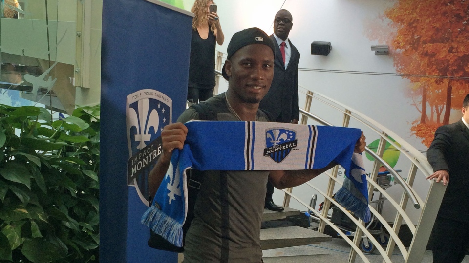 Soccer star Drogba lands in Montreal to crush of fans | CTV News