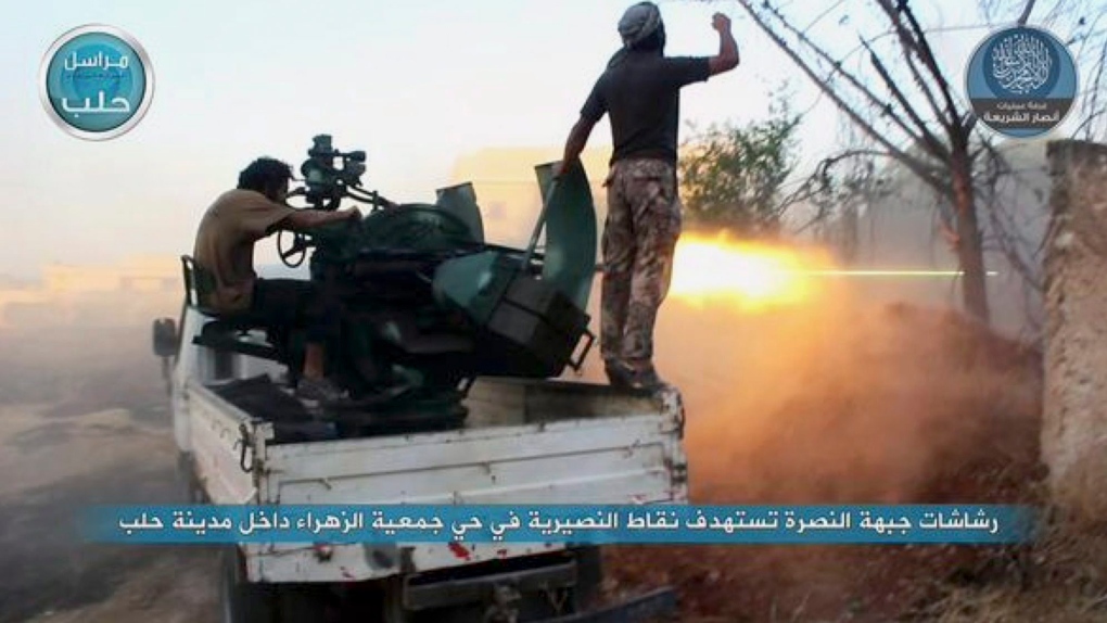 Al-Nusra Front fire weapons