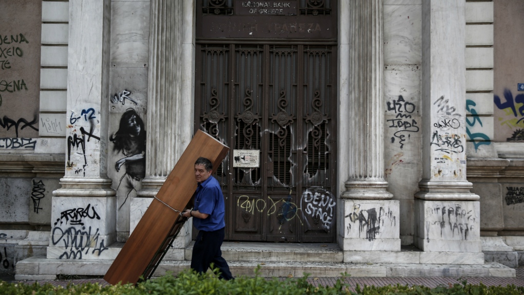 Greece stock market reopens with losses
