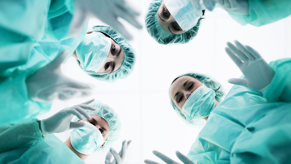Group of surgeons in scrubs