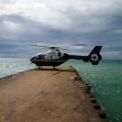 An OPP helicopter takes part in a search for a missing 16-year-old swimmer near Kincardine, Ont. on Tuesday, Aug. 4, 2015. (@OPP_WR / Twitter)