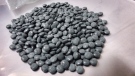 Fentanyl pills are shown in a handout photo. (Alberta Law Enforcement Response Teams (ALERT) )
