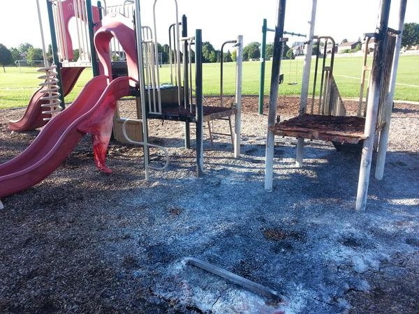 A playground set was destroyed by a suspicious fire in southwest London, Ont. on Wednesday, Aug. 5, 2015. (Justin Zadorsky / CTV London)