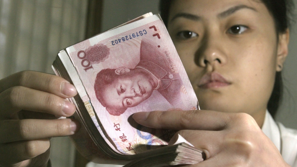 Chinese yuan at a bank in Beijing