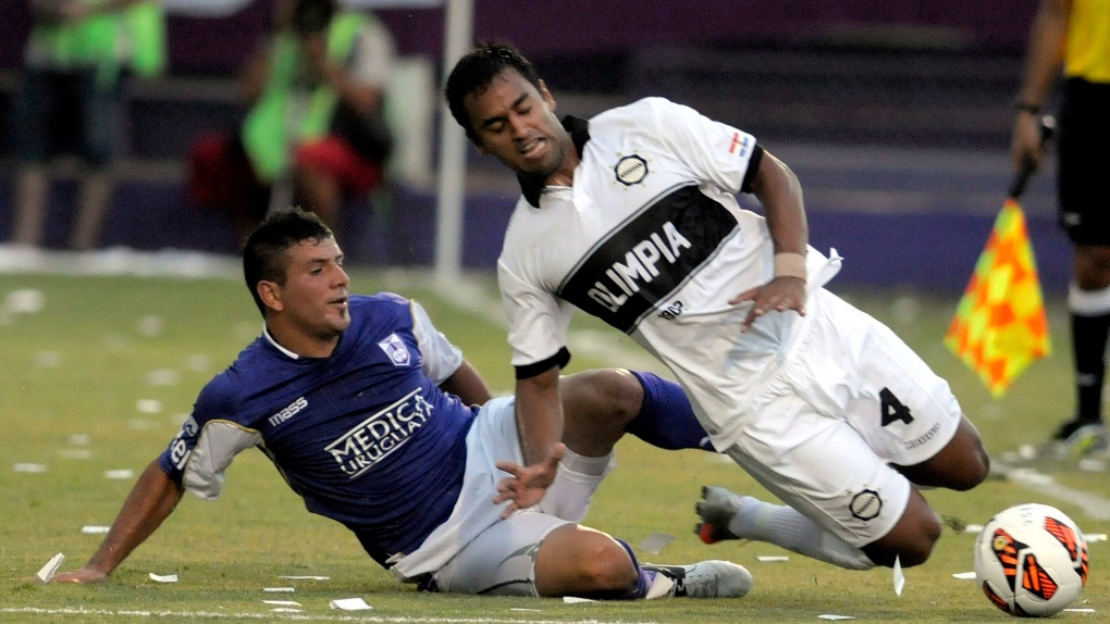 Sebastian Ariosa fights for football