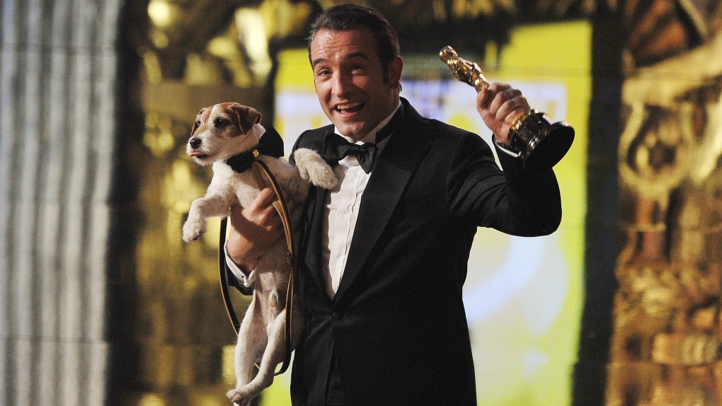 Uggie and Jean Dujardin at Oscars