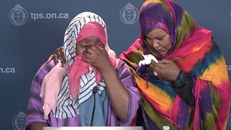 The family of shooting victim Kabil Abdulkhadir appeals for help in the investigation at Toronto Police headquarters on Wednesday, Aug. 12, 2015. 