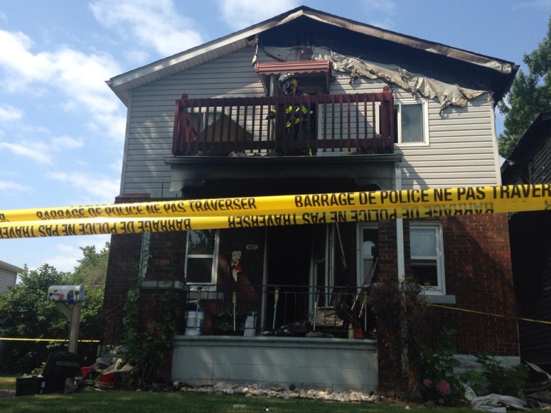 Police tape remains around the scene of a fatal fire on Aubin Road in Windsor, Ont. on Thursday, Aug. 13, 2015. (Chris Campbell / CTV Windsor)