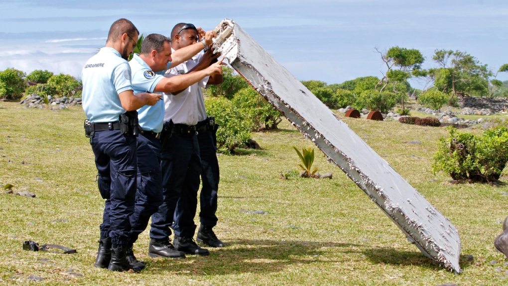 Inspecting debris in Saint-Andre, Reunion Island