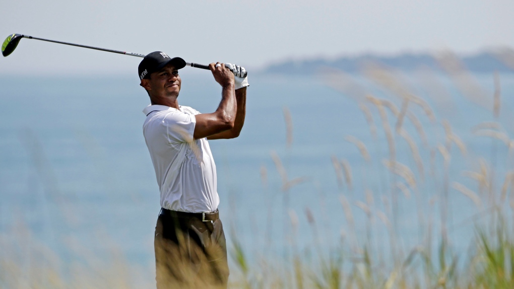 Tiger Woods plays at the 2014 PGA Championship