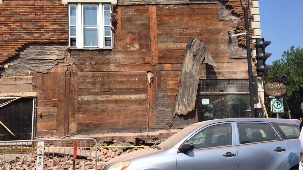 A brick wall collapsed at St. Denis and Liege