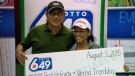 Rod Holinaty and Verna Tremblay pose after being presented a Lotto 6-49 cheque of $14.2 million. 