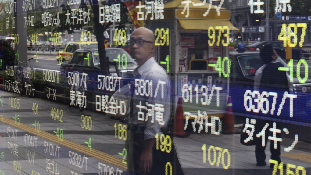 Asian stocks fall on rate hike suggestion