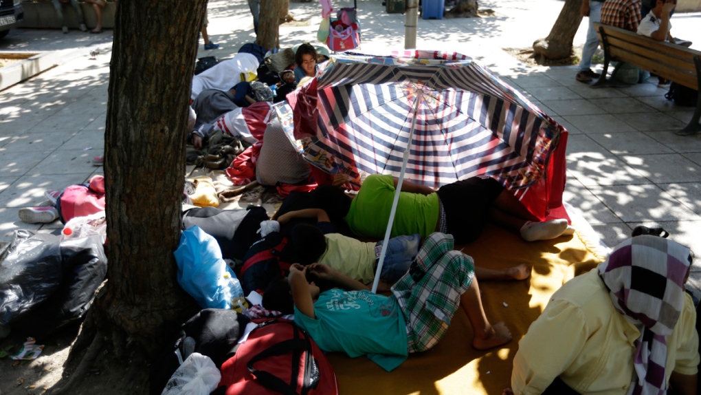 Migrants in Victoria square, Athens