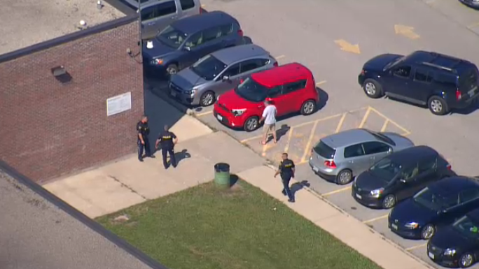 Police are seen on the scene at the Mayfield Secondary School in Caledon, Ont. 