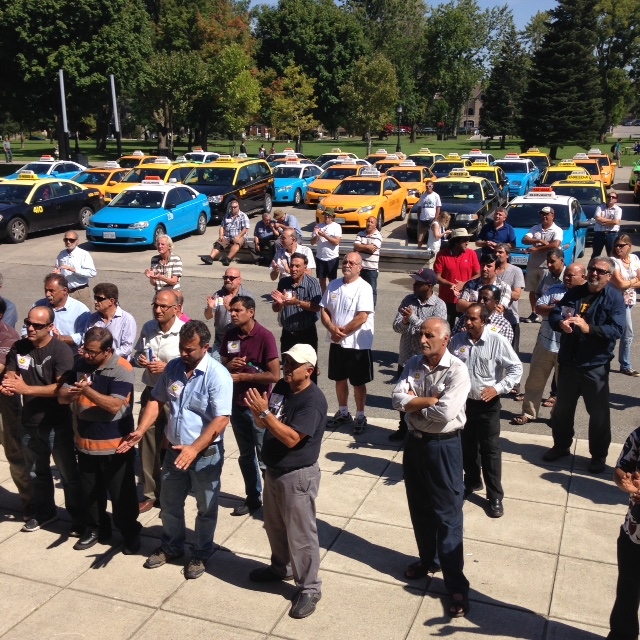 Taxi drivers attend a rally against Uber in London, Ont., on Wednesday, Sept. 16, 2015. (Bryan Bicknell / CTV Windsor)