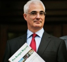 Britain's Treasury Chief Alistair Darling leaves the Treasury on his way to the Houses of Parliament to present his annual pre-budget, in central London, Monday Nov. 24, 2008. (AP / Lefteris Pitarakis) 