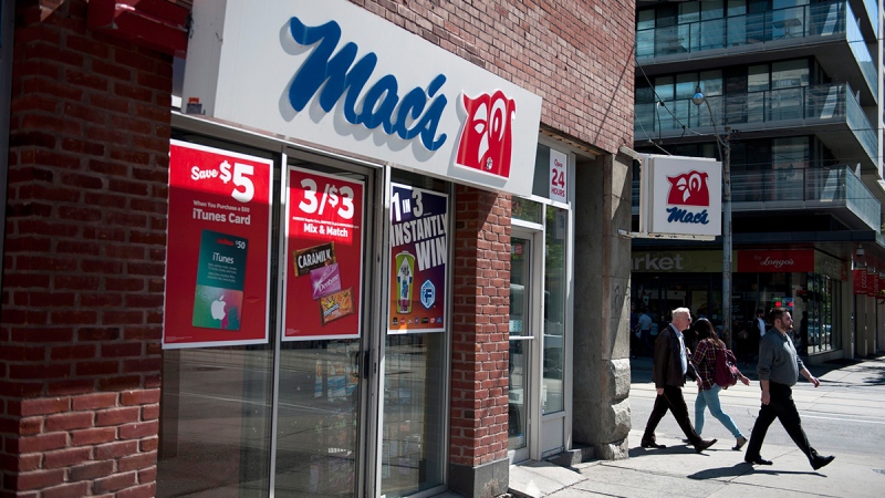 People walk by a Mac's convenience store in Toronto, Tuesday, Sept, 22, 2015. (Marta Iwanek / THE CANADIAN PRESS)
