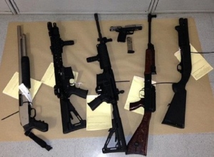 Six guns seized in a bust by the Barrie Police Service can be seen in Barrie, Ont. on Wednesday, Sept. 23, 2015. (Barrie Police Service)