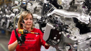 Engine Specialist Jennifer Souch assembles a Camaro engine at the GM factory in Oshawa, Ont.  on Friday, June 10, 2011. (Frank Gunn / THE CANADIAN PRESS)
