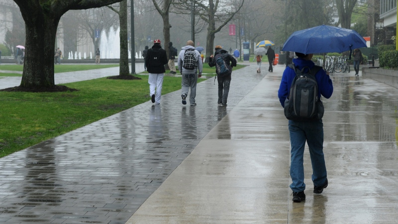 Students walk at the University of British Columbia, in Vancouver, on April 19, 2013. (Don Denton/The Canadian Press)