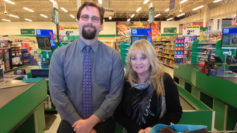 Extra Foods grocery manager Darryl Laxdal and Linda Russell at the grocery store on St. Anne’s Road.