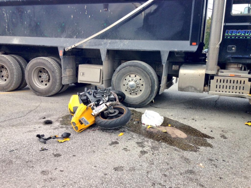 What remains after a motorcycle collided with a dump truck is seen in Tecumseh, Ont. on Friday, Oct. 2, 2015. (Melissa Nakhavoly / CTV Windsor)