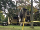 An investigation is underway after the roof of a farmhouse collapsed in a weekend fire near Strathroy, Ont. on Monday, Oct. 5, 2015. (Colleen MacDonald / CTV London)