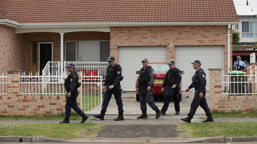 Police investigate terror-linked slaying in Sydney