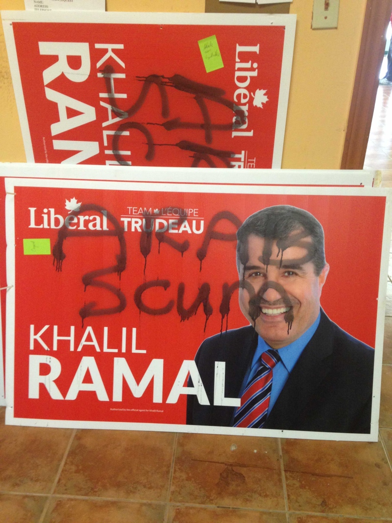 A sign for London-Fanshawe Liberal candidate Khalil Ramal was scrawled with racist graffiti in London, Ont., as seen Wednesday, Oct. 7, 2015. (Celine Moreau / CTV London)