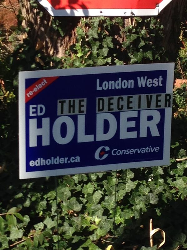 Defaced Ed Holder sign