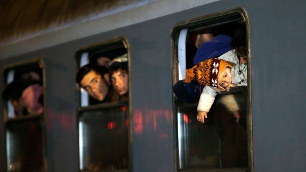 Migrants take train to Slovenia