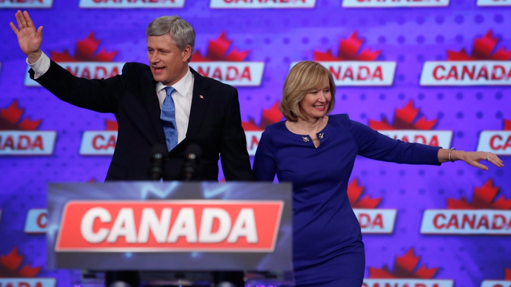 Stephen and Laureen Harper wave to supporters