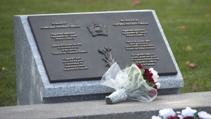A plaque is unveiled during a ceremony to honour Cpl. Nathan Cirillo at the National War Memorial in Ottawa on Thursday Oct. 22, 2015. (Sean Kilpatrick / THE CANADIAN PRESS)
