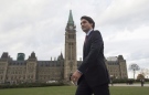 Prime minister-designate Justin Trudeau walks to a news conference from Parliament Hill in Ottawa on Oct. 20, 2015.  (Adrian Wyld / THE CANADIAN PRESS)