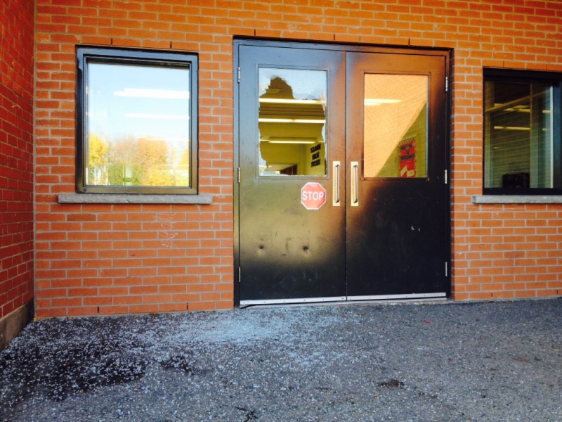 Smashed glass is seen at Tweedsmuir Public School in east London, Ont. on Monday, Oct. 26, 2015. (Sean Irvine / CTV London)