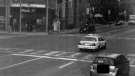 A red light camera captures a police cruiser going through the intersection 8.6 seconds after the traffic light turned red at Eglinton Ave E. and Mount Pleasant Road on Oct. 30 2014. 
