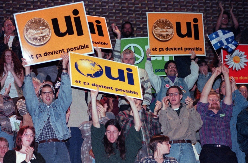 Yes supporters cheer during a speech by Bloc Quebecois Leader Lucien Bouchard at a junior college in Montreal Tuesday, Oct. 24, 1995. (Ryan Remiorz/ THE CANADIAN PRESS)