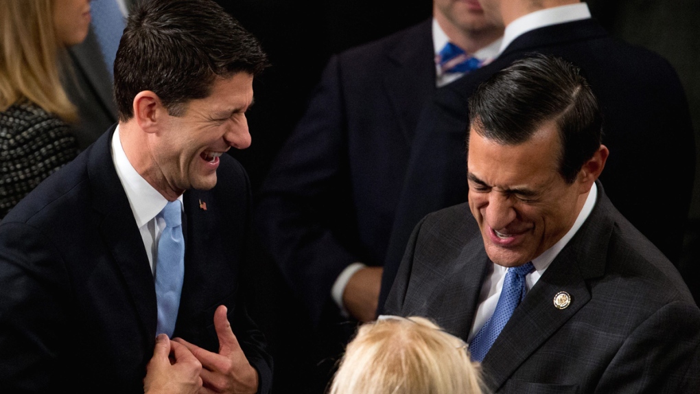 Paul Ryan laughs with Darrell Issa