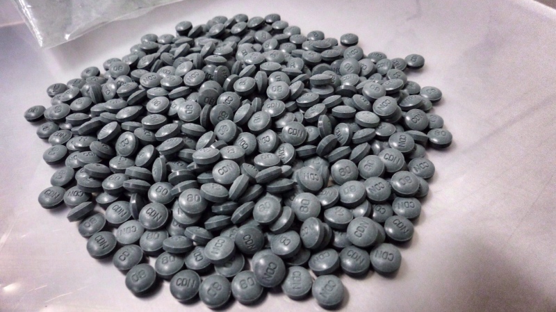 Fentanyl pills are shown in an undated police handout photo. (The Canadian Press/HO - Alberta Law Enforcement Response Teams)