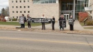 Protest outside Pembroke court.