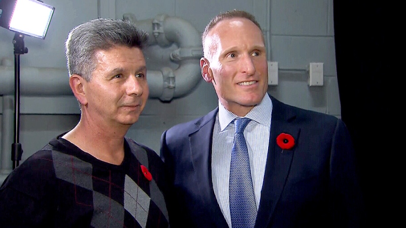 Interim Blue Jays GM Tony LaCava and the team's new president and chief executive officer Mark Shapiro pose after a scrum Monday, Nov. 2, 2015.