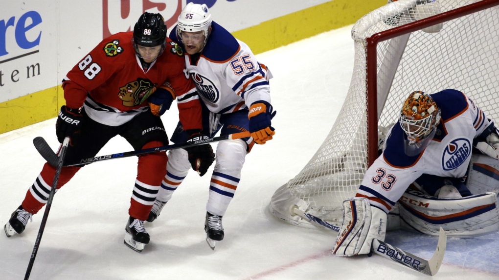 Patrick Kane plays against the Oilers