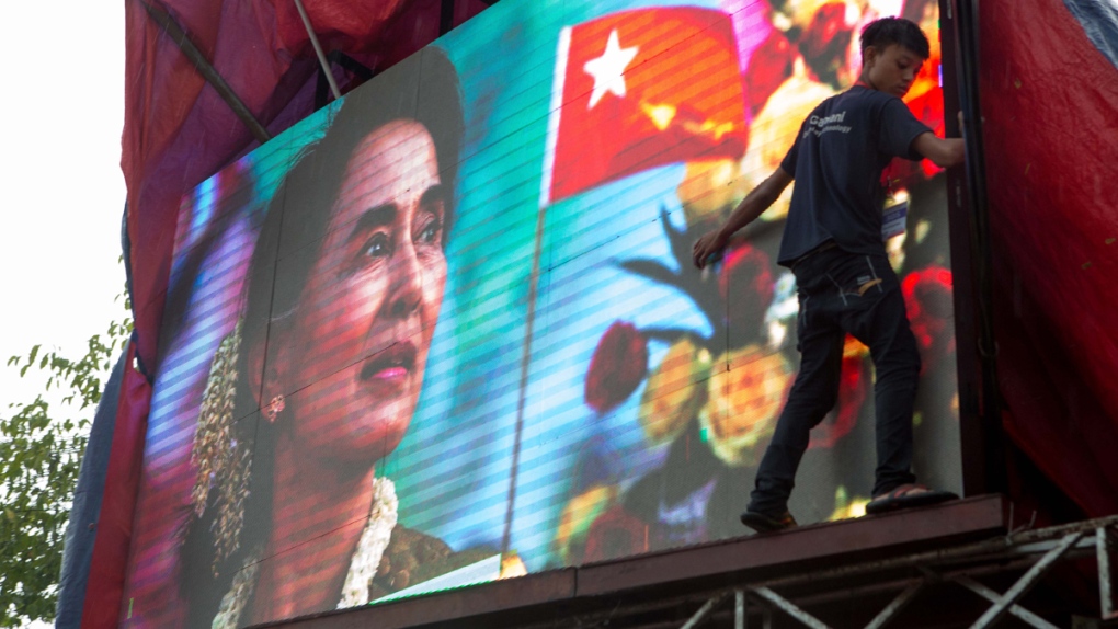 TV showing images of Aung San Suu Kyi