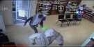 Windsor police have released surveillance video of an armed robbery at a pharmacy in Windsor, Ont. (Windsor police/YouTube)