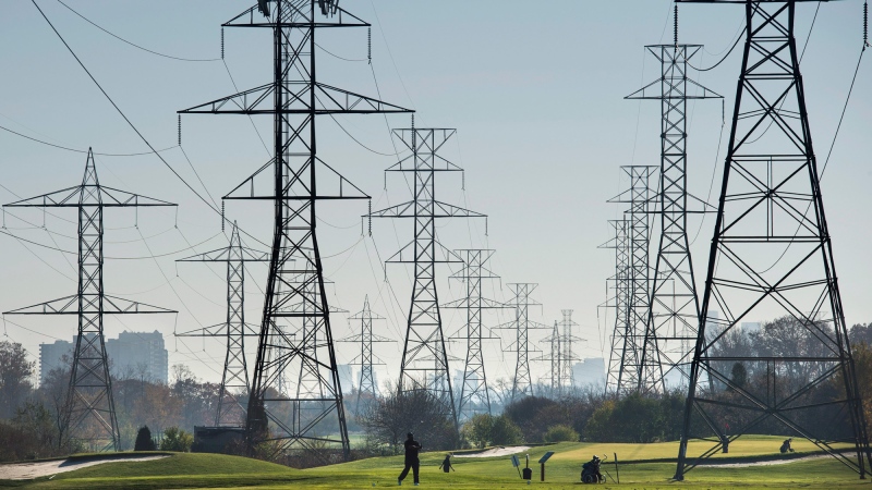 Hydro towers are seen over a golf course in Toronto on Wednesday, Nov. 4, 2015. (The Canadian Press/Darren Calabrese)